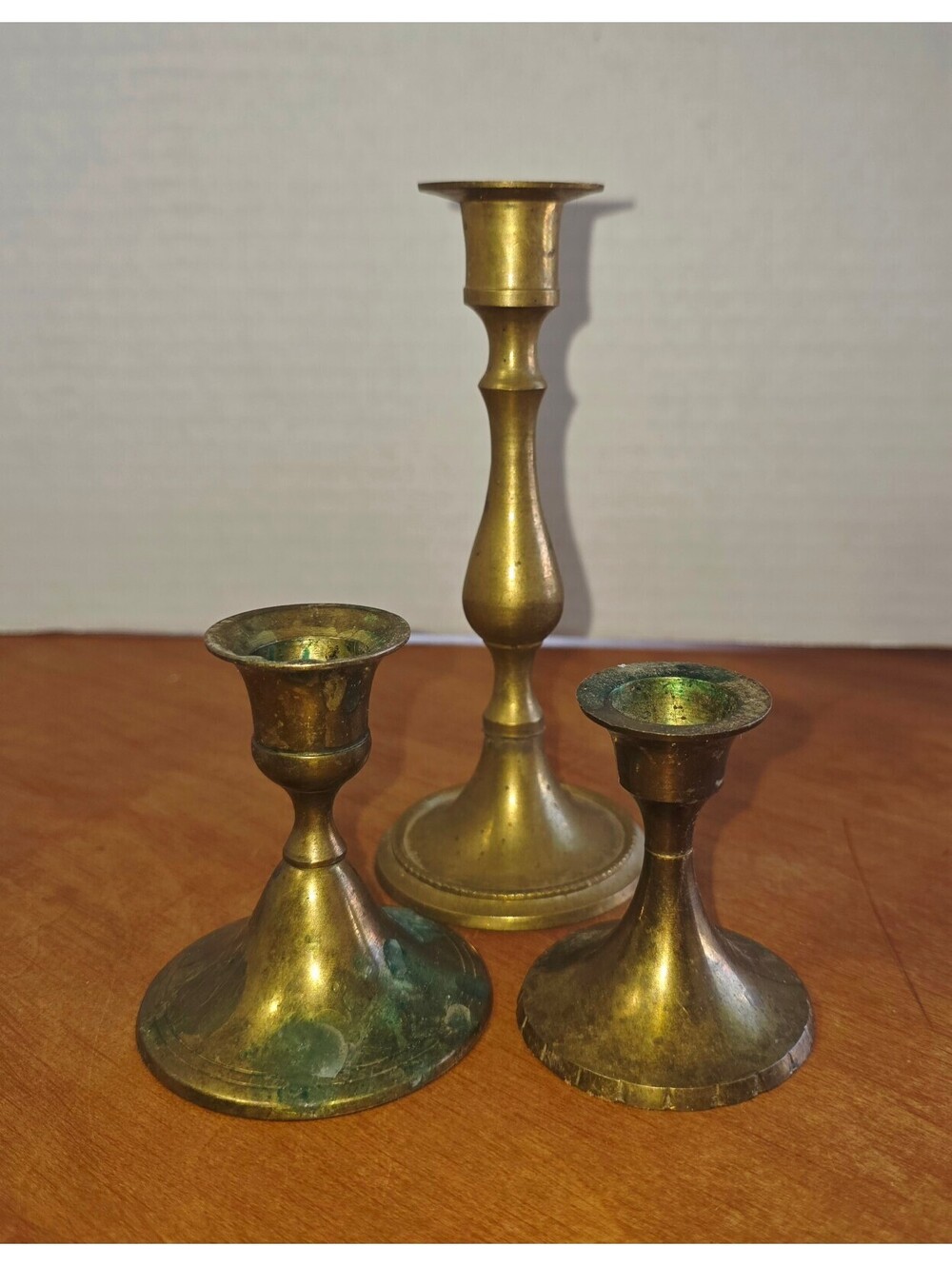 Set of 3 brass candlesticks